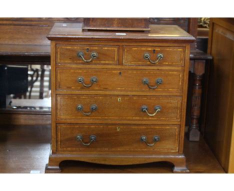 Late 19th Century mahogany and line inlaid miniature chest of two short above three long drawers on bracket feet, 48cm high b