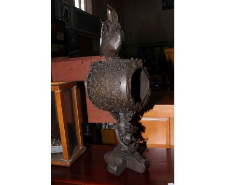 Cast clock case with oriental cockerel finial, 60cm high.