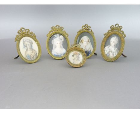 Five portrait miniatures on ivory of ladiesimages 6.5 x 5cm, smallest 3.5cm diameter, in decorative brass frames (5)