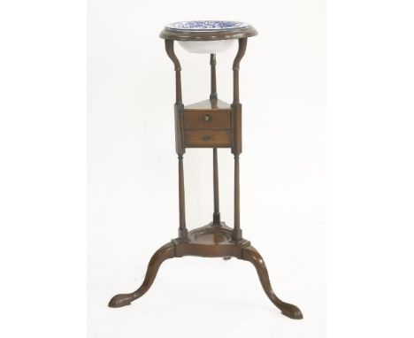 A 19th century mahogany washstand, the circular top over two drawers, an undertier and tripod base, together with a Victorian