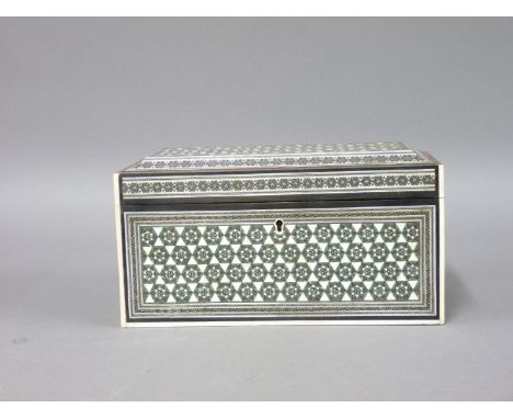 An Indian Sedeli tea caddy, of rectangular form with white geometric inlay, the interior with two compartments
