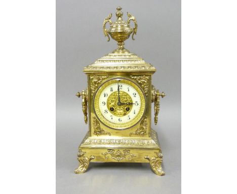 A Victorian gilt brass mantel clock, with French drum movement and urn finial, 40cm high, lacking bell
