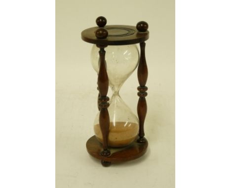 A 19th century timer, in turned rosewood stand, 20.5cm