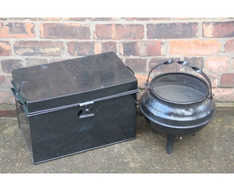 A tin trunk, dated 'November 22nd 1843, Joseph Evans', containing a mirror and a brass wall mountable bell along with a cauld