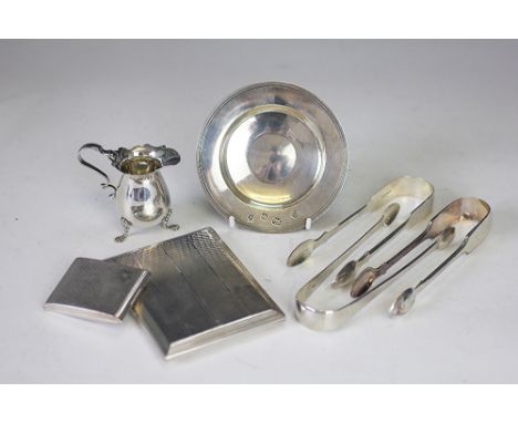 A selection of silver to include a silver Edward VII milk jug, S&Co Birmingham 1901, raised on three shell cast feet, a silve