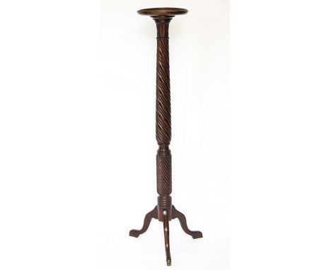 A Victorian carved mahogany jardiniere stand, with spiral column on tripod base, 141cm