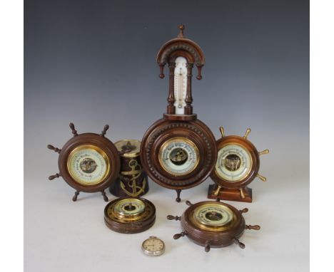 A collection of six barometers, to include a late Victorian walnut example with inset barometer, 41cm