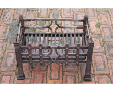 A cast iron fire grate / dog grate, 50cm wide