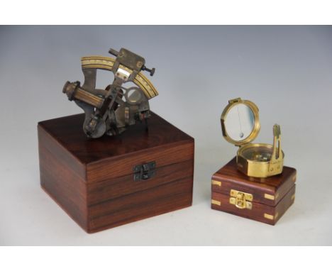 A Kelvin & Hughes sextant, dated 1917, 12.5cm long, 7cm high, along with a Stanley brass cased compass, 3.5cm high, both with