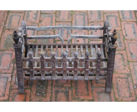 A George III style cast iron fire grate, 50cm wide, with a fire front (2)