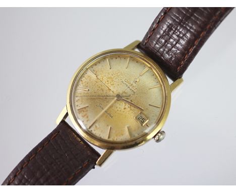 A yellow gold gents Omega Seamaster, Automatic wristwatch, the silvered dial with batons, centre sweep seconds and subsidiary