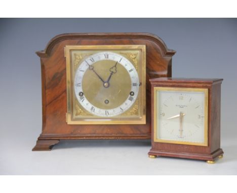 An Elliott walnut chiming mantel clock, retailed by Boodle and Dunthorne, with silvered chapter ring and movement striking on