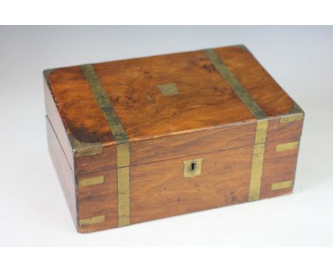 A 19th century brass bound walnut writing slope, enclosing a needle case, buttons, autographs album and other items, with a 1