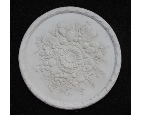 A 19th century stone garden ball finial, 27cm, with three plaster ceiling roses, 57cm (4)