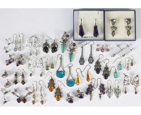 A selection of earrings, pairs to include; amethyst crystals, topaz, garnets, marcasite, cz's, malachite, opal doublets etc (