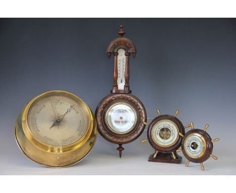 A brass bulk head style barometer, with silvered dial (modern mechanism), 27cm, with three other barometers (4)