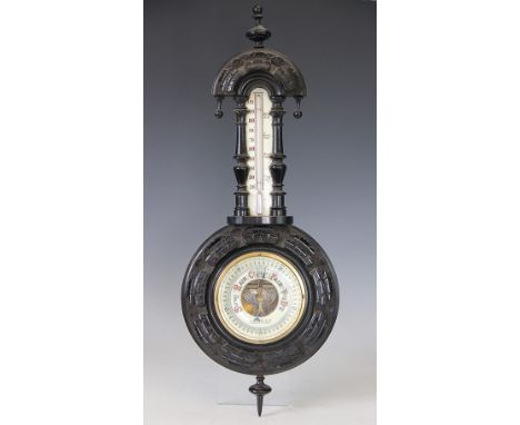 A Victorian ebonised aneroid barometer, with thermomenter, retailed by Blair & Co Cardiff and Barry, 56cm