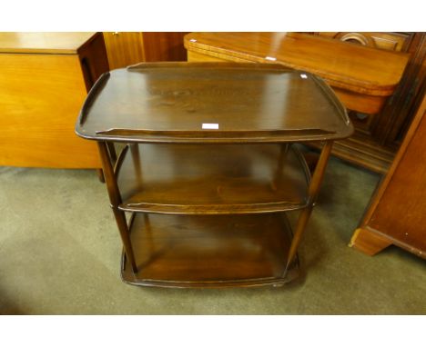 An Ercol Golden Dawn elm and beech Windsor trolley 