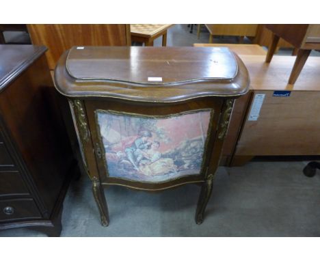 A French Louis XV style mahogany and gilt metal mounted petit commode, with decorative Watteauesque style panels 