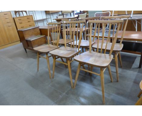 A set of six Ercol Blonde elm and beech 391 model dining chairs 