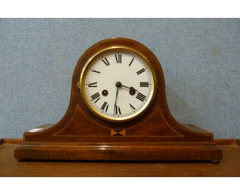 An inlaid mahogany mantle clock 