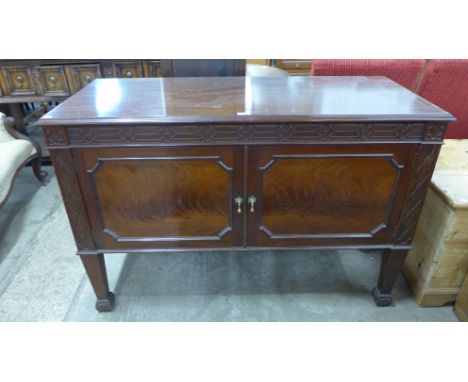 An Edward VII Chippendale Revival mahogany two door washstand 