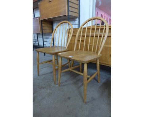 A pair of Ercol Blonde elm and beech Windsor chairs 
