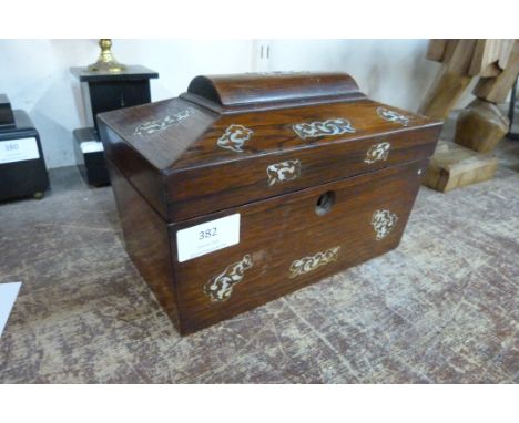 A Victorian rosewood and mother of pearl inlaid sarcophagus shaped tea caddy 
