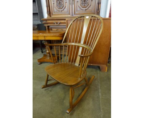 An Ercol Golden Dawn elm and beech Chairmakers rocking chair 