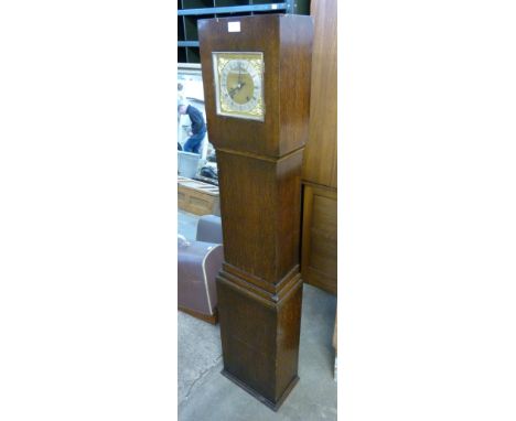 An Art Deco oak dwarf longcase clock 