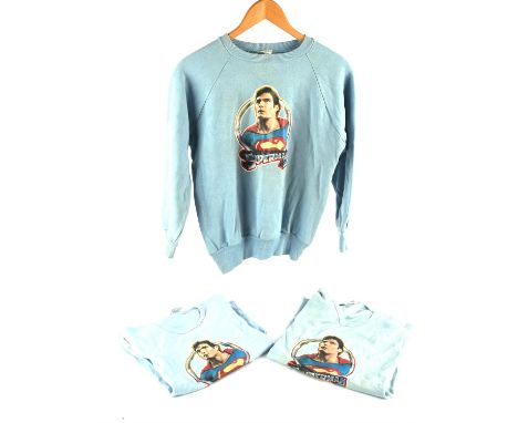 Superman II - T shirt , states size M, T shirt , states size L, sweatshirt states size L. From the estate of Alan Frank , fil