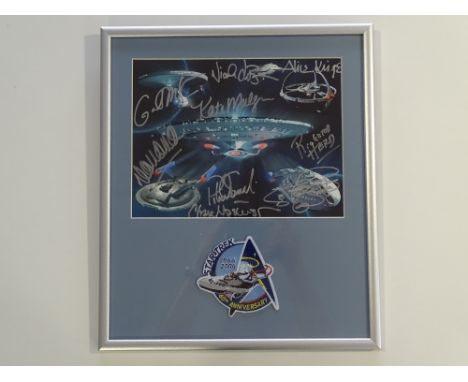 Autograph: STAR TREK - A framed and glazed Star Trek 40th Anniversary print with embroidered anniversary badge and signatures