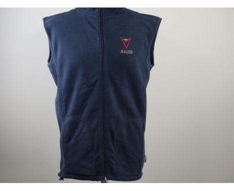 ALLIED: BRAD PITT -  Film / Production Crew Issued Clothing to include: A Cap and an 'L' navy blue gilet: PROVENANCE: These c