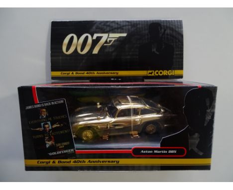 JAMES BOND: A Corgi/Bond 40th Anniversary diecast gold Aston Martin DB5 - box has been signed by HONOR BLACKMAN (Pussy Galore