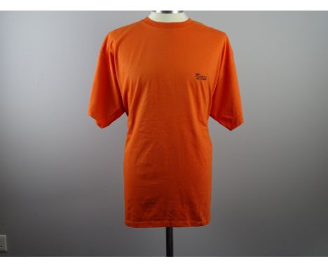 JAMES BOND: THE WORLD IS NOT ENOUGH: Film / Production Crew Issued Clothing: An orange stunt crew XXL t-shirt- unworn PROVENA