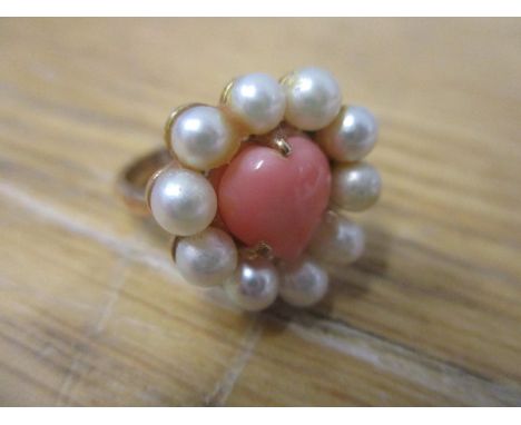 A 9ct gold coral and pearl heart shaped ring, 4.6g 