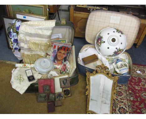 Two vintage suitcases containing vintage linen and ephemera, scarves, a retro ceramic ceiling light and other items, includin