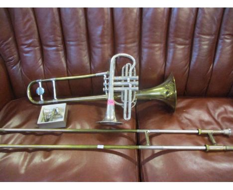 A Boosey &amp; Hawkes Regent gold and silver coloured trombone, together with a Rosehill silver coloured trumpet and various 