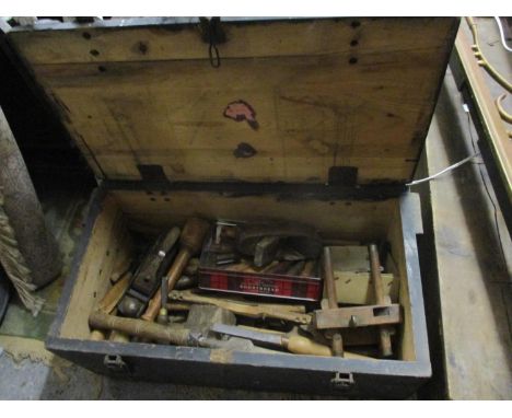 A vintage chest containing mixed wood working tools to include a Stanley plane 
