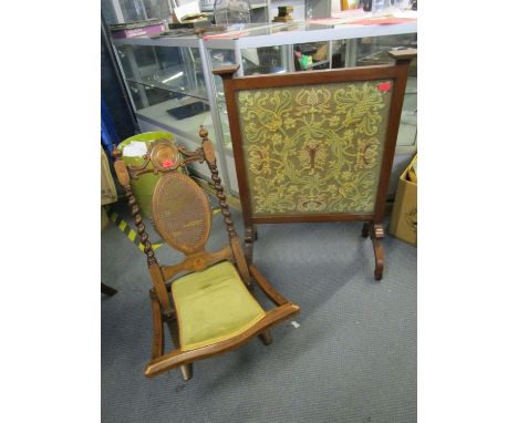 A Victorian inlaid mahogany folding chair with upholstered seat, oval caned panel to back, flanked by barley twist columns, a