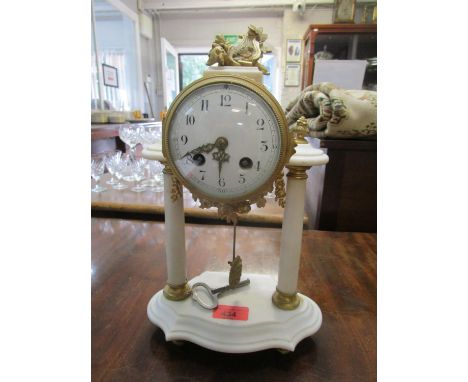 A French white alabaster and guilt metal mantle clock, movement striking on a bell (with key) A/F 