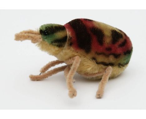 Spinne "Spidy", Steiff. Verschiedenfarbiger Mohair, Beine mit Drahteinlage. L. 12 cm.