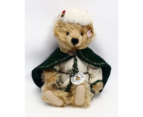 Teddy "König Melchior", Steiff. Original bekleidet, Art.-Nr. 655708, mit Knopf, Fahne, Porzellanplakette und Originalbeutel. 