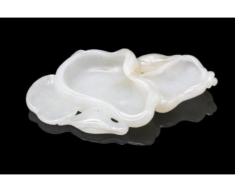 A JADE ‘LOTUS’ BRUSHWASHERChina, 20th centuryL: 10 cmCondition Report:  Condition report: Natural veins and inclusions in the