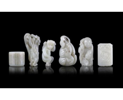 A GROUP OF SIX (6) JADE CARVINGSChina, ModernThe first one is a monkey with a peach. The second one is a double gourd / calab