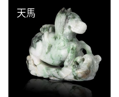 A LARGE JADEITE JADE CARVING OF A ‘HEAVENLY HORSE’, TIAN MA 天馬 China, Attributed to Qing Dynasty Carved out of a white, apple