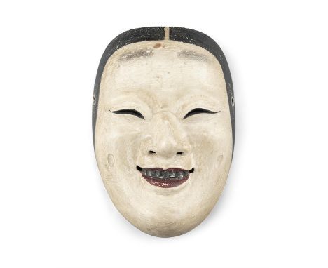 A KYOGEN THEATER MASK OF A SMILING WOMANJapan, Meiji-Taisho periodA lacquered wooden mask, the inner part with an engraved Ja