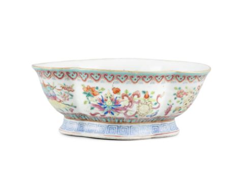 A LARGE FOLIATE RIM FAMILLE ROSE PALETTE ‘EIGHT TREASURES OF BUDDHISM’ PORCELAIN OFFERING CUP China, Qing Dynasty, Daoguang m