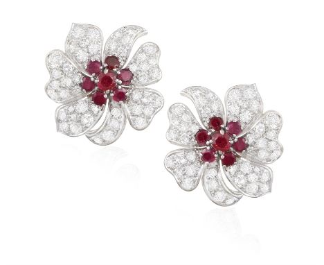 A PAIR OF RUBY AND DIAMOND EARRINGSEach flowerhead set with brilliant-cut diamond petals and circular-cut rubies for pistils,