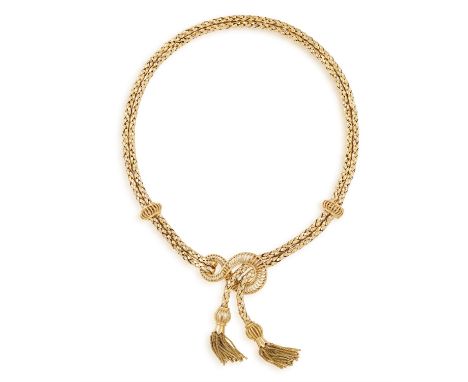 A GOLD NECKLACE, CIRCA 1950The fancy-link double chain necklace with openwork gold connectors, the frontispiece of similar de